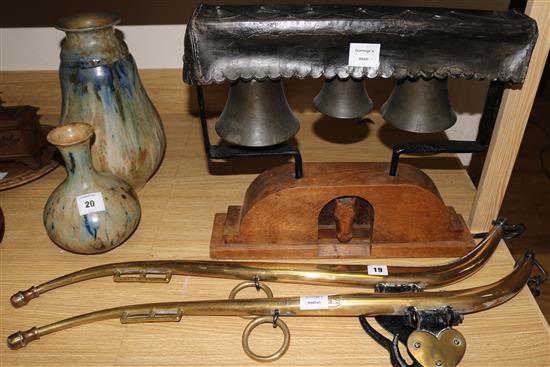 A pair of Victorian brass and iron hames and a mounted set of three latten bells